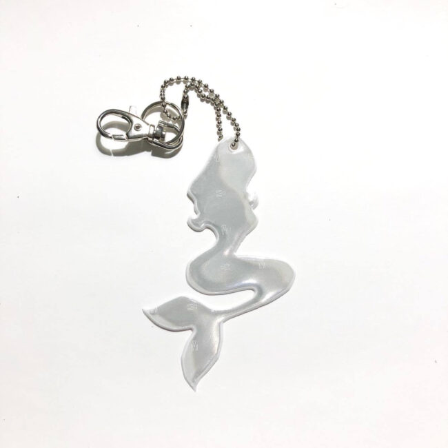 titiMadam_mermaid_heijastin Merenneito heijastin suojaa pimeässä.