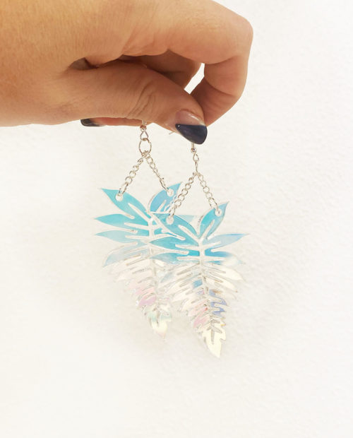 Fern shaped earrings in iridescent acrylic.