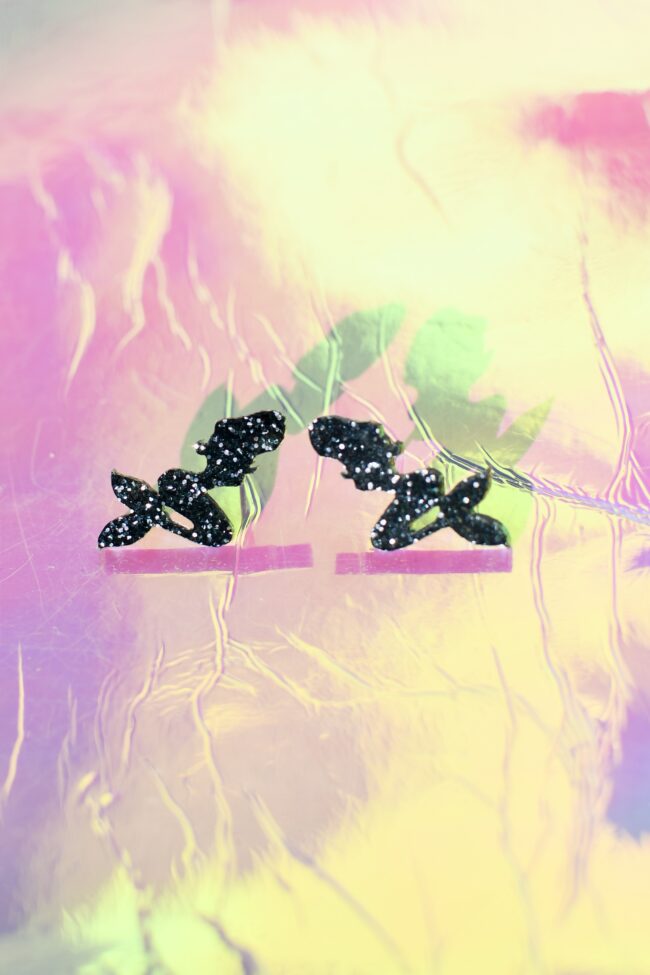 Glitter Merenneito Nappikorvakorut musta titiMadam Glitter Merenneito Nappikorvakorut musta titiMadam