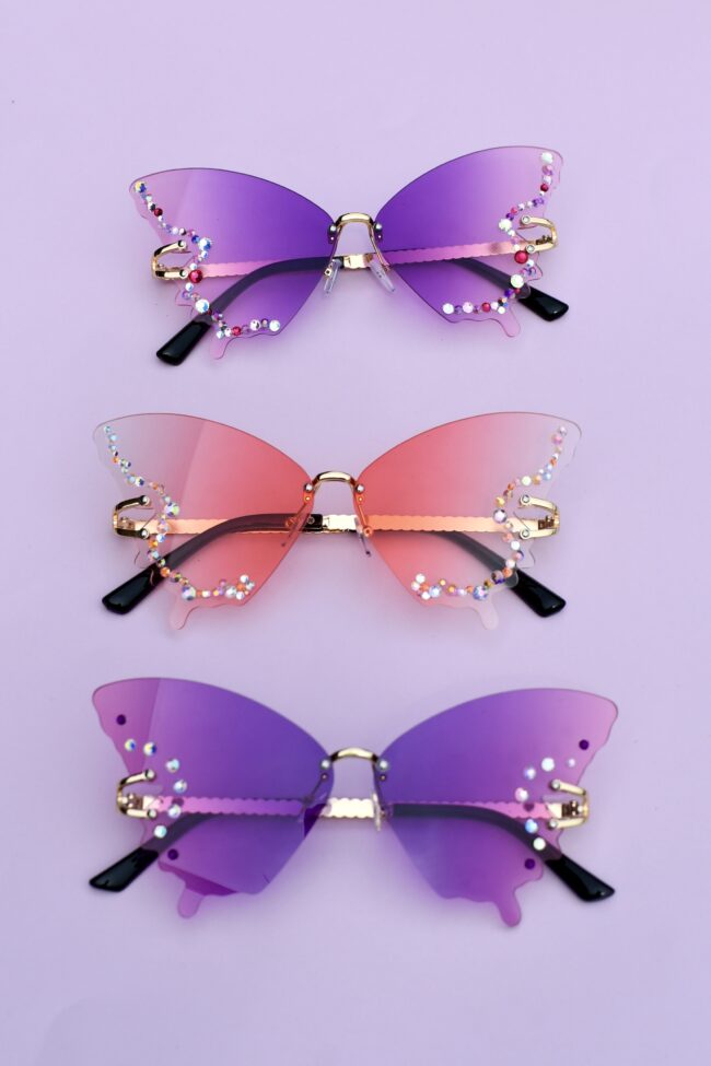 Timanttikoristeiset perhosen muotoiset värikkäät aurinkolasit liukuväri titiMadam Timanttikoristeiset perhosen muotoiset värikkäät aurinkolasit liukuväri titiMadam